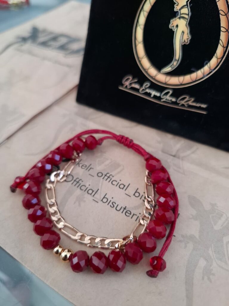 Pulsera doble cristales rubi con cadena figaro dorada – Pul10