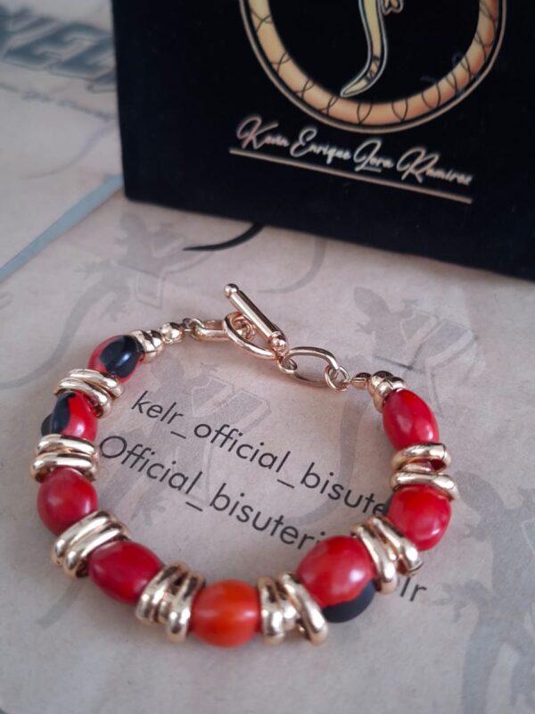 Pulsera Coral y Azabache con Separadores Dorados - Pul30